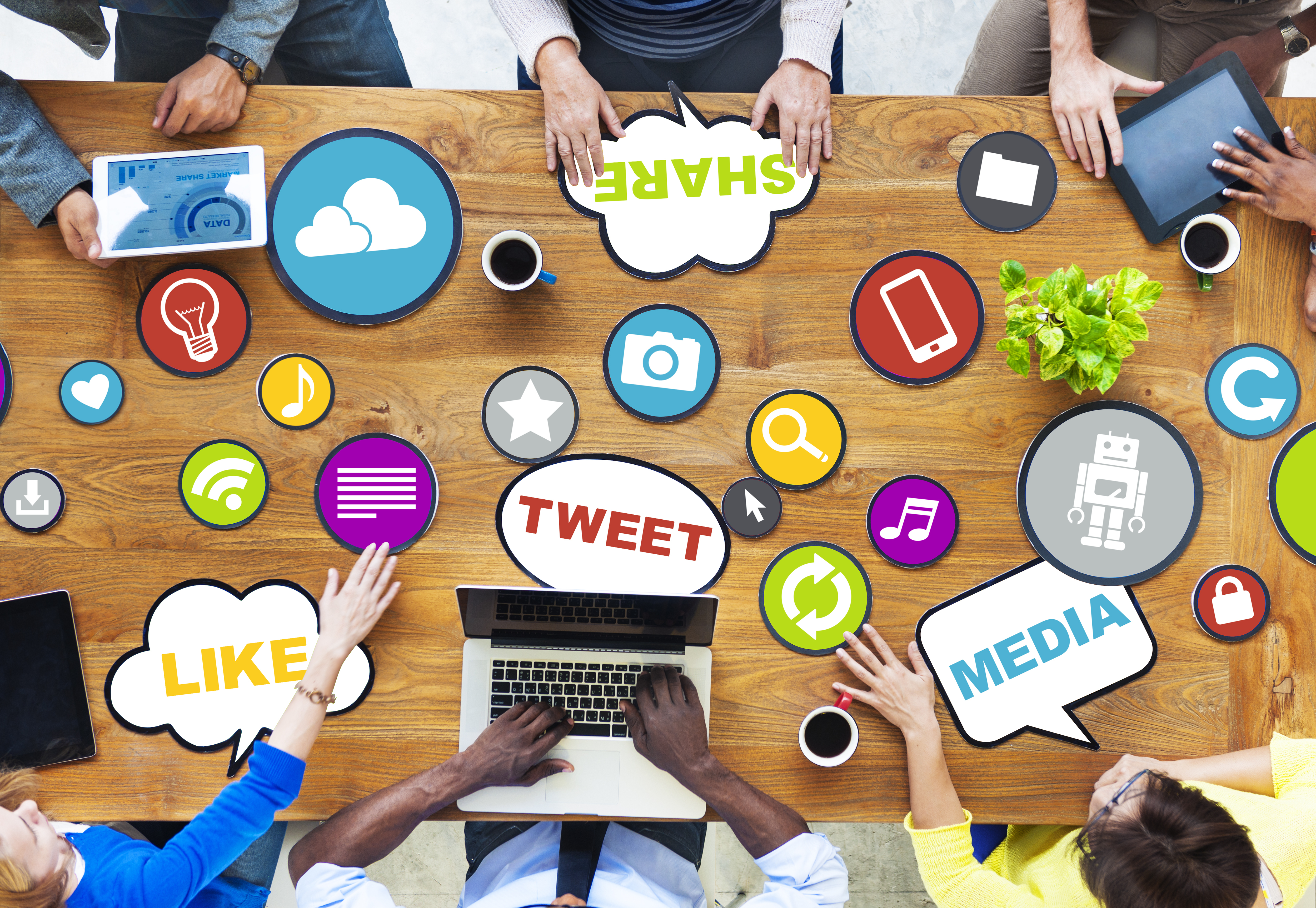 Image of people meeting to discuss social media